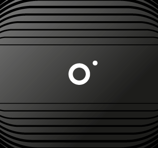 Icono blanco en fondo negro, simulando un ojo o cámara digital